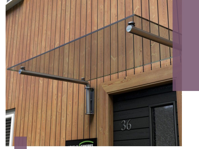 Стеклянные козырьки на входы и фасады в Нефтеюганске